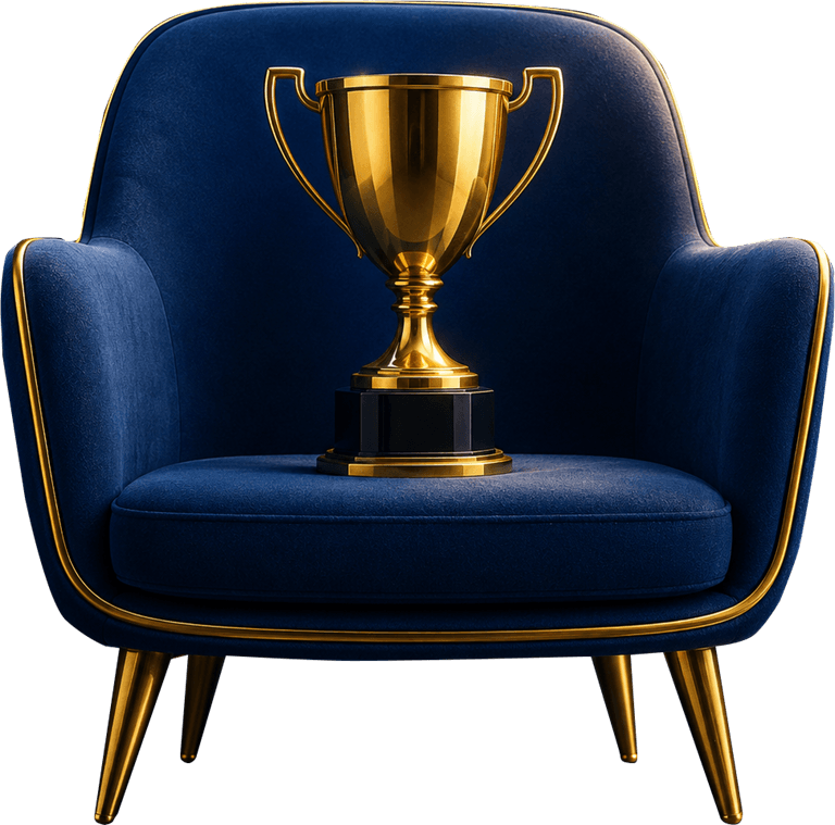 A gold trophy on a navy velvet armchair